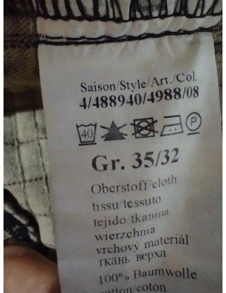 Pantaloni tip jeans cu aspect prespalat